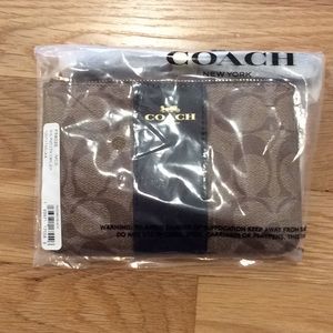 Brown Coach wristlet
